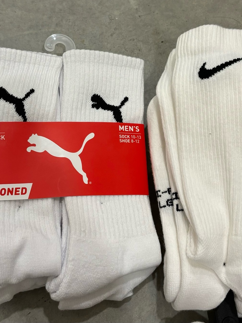 10 white sports socks - 5 Nike, 5 Puma